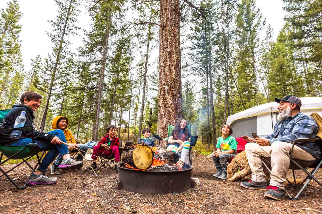 Campers enjoying a campfire at a campground near Philipsburg, Montana.